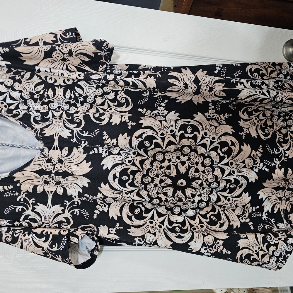 Elegant Black and Cream Floral Blouse